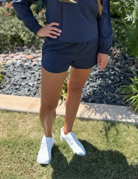 Rhone Apparel- "2.5" Mirage Short- Navy Blue - Tres Chic Boutique